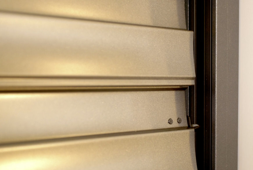 Consistent and modern look of facades - Zetra slat and A 37 shutter profile
